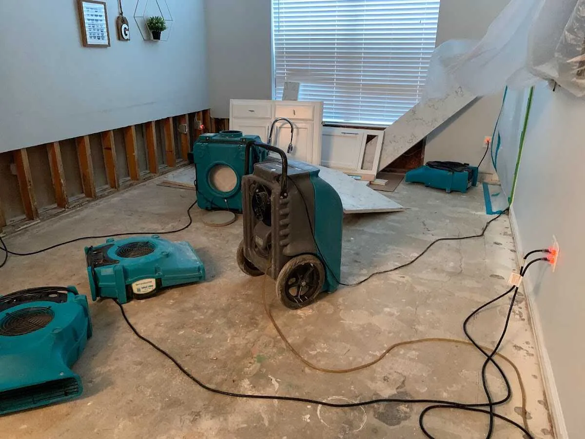 Dehumidifier in flood-cut room for Water Damage Restoration in Highland City